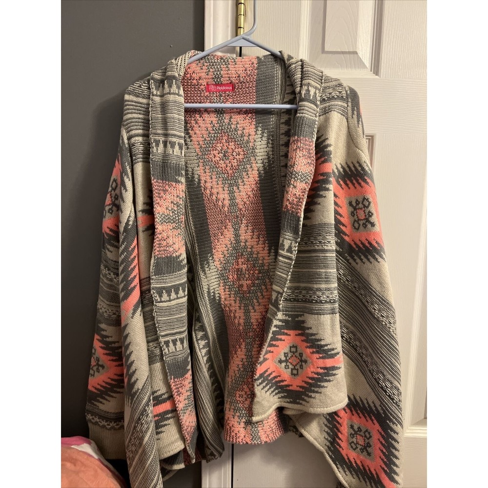 pinklicious cardigan size M/L.   GB3